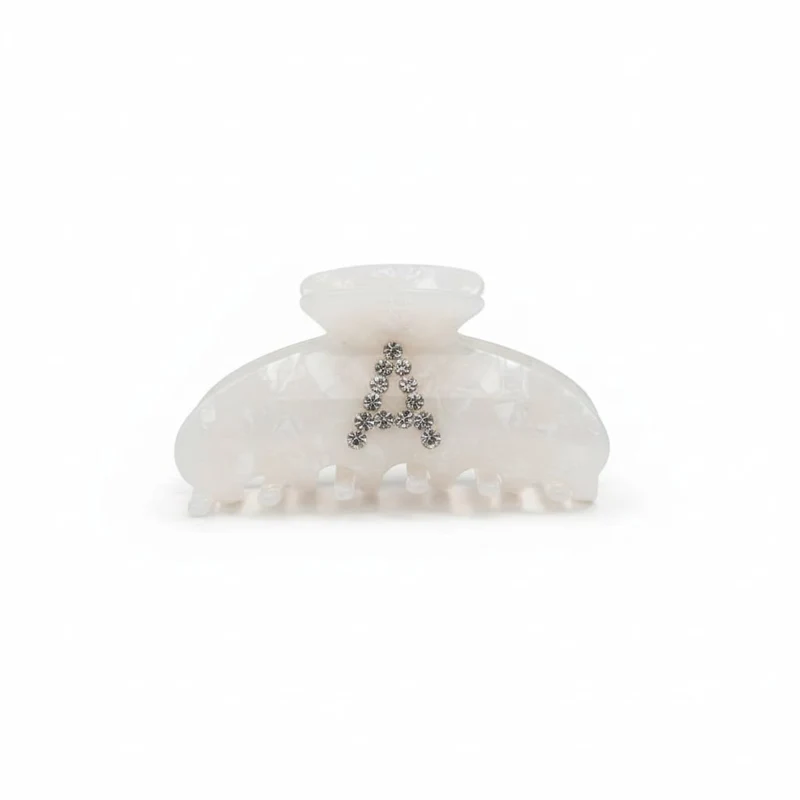 Pinza con lettera in strass scintillanti - var 1