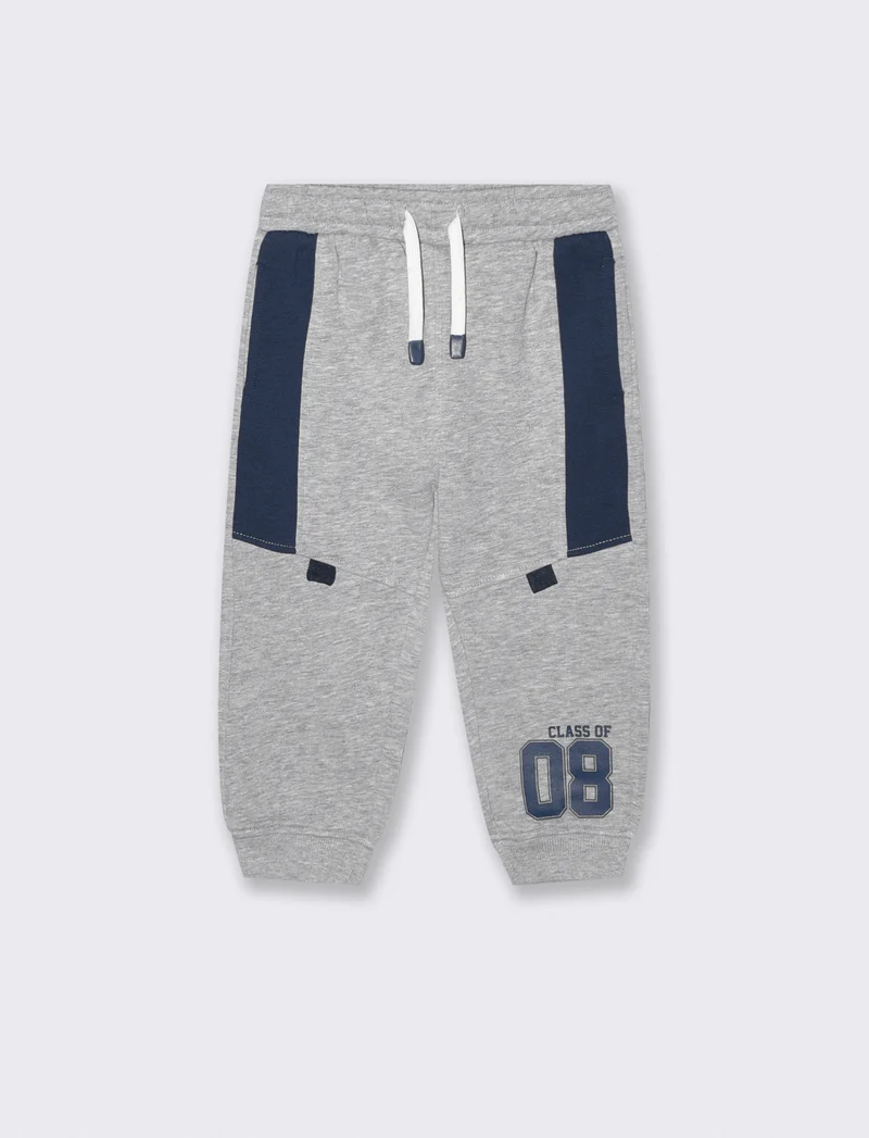 Pantaloni jogger con dettagli a contrasto - Grigio mel.