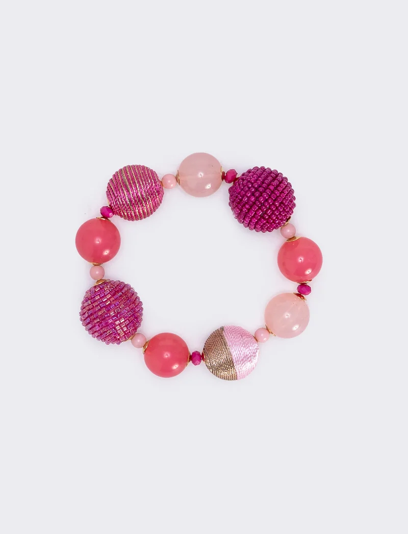 Bracciale elastico con sfere di conteria - Fuxia