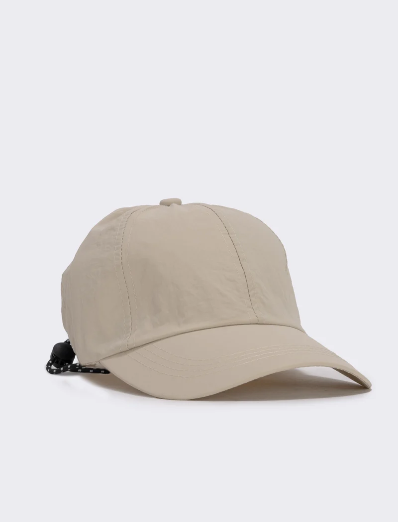 Baseball in tessuto tecnico con cordoncino - Beige