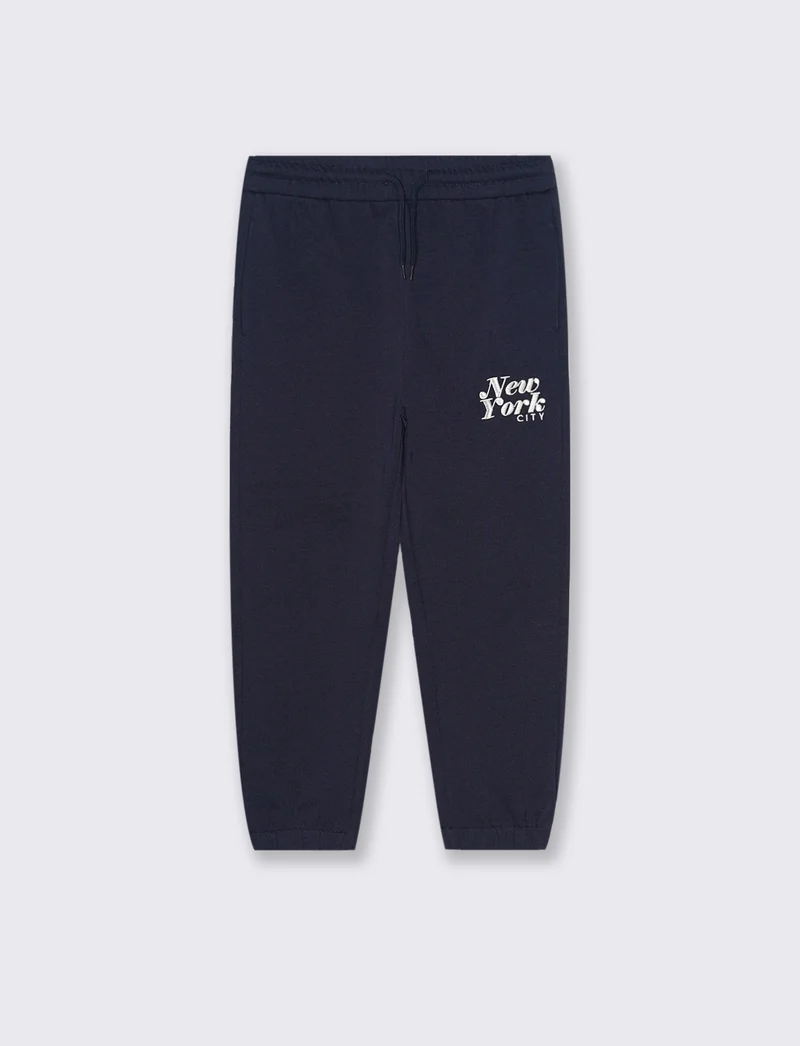 Jogger con ricamo college. - Blu